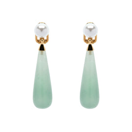 Pair of earrings with white pearls and green teardrop-shaped stones on a white background