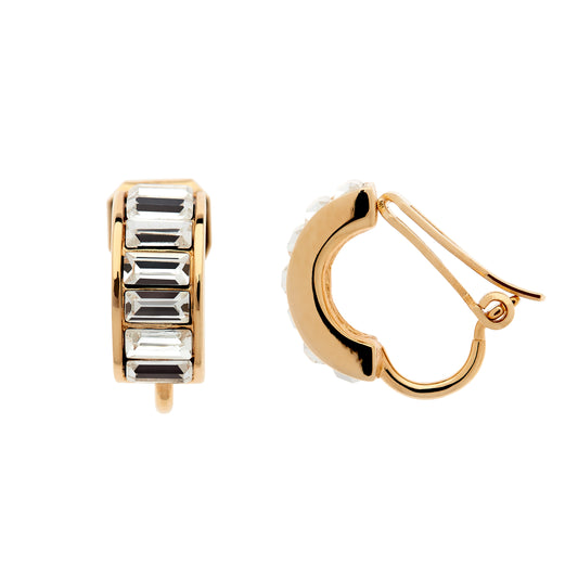 A pair of gold-colored clip-on earrings featuring baguette-cut crystals, displayed against a white background.