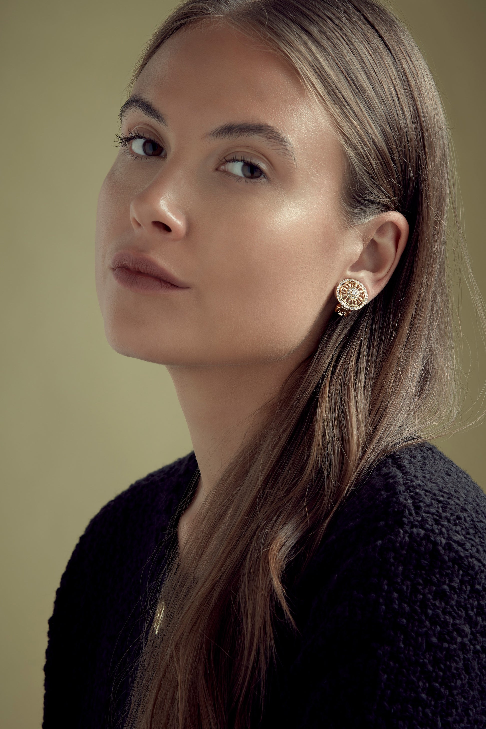 gold crystal clip earring on model