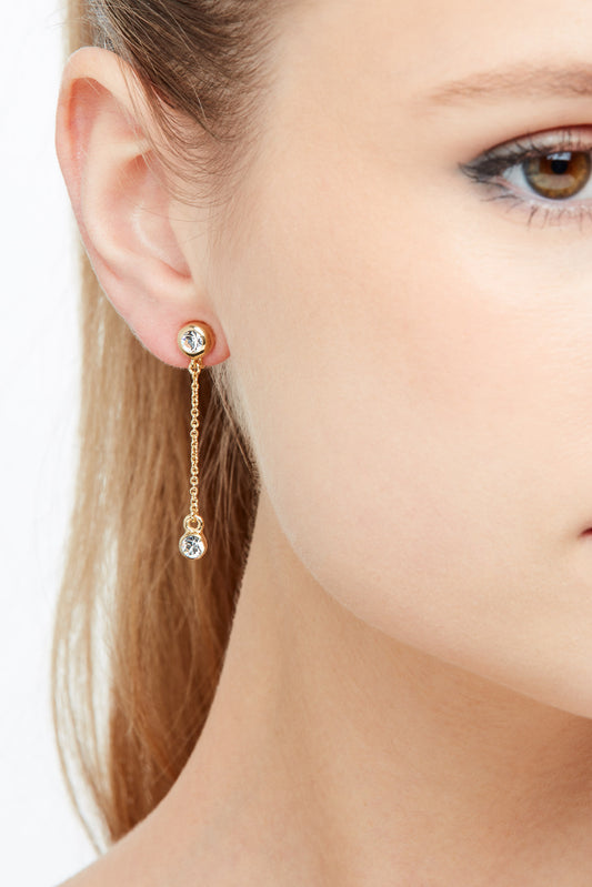 A pair of pretty gold crystal and chain clip on earrings