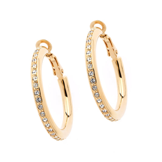 A pair of gold hoop clip earrings adorned with sparkling crystals along the hoop's edge.