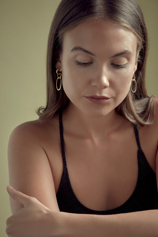 Model with Emma Holland earrings