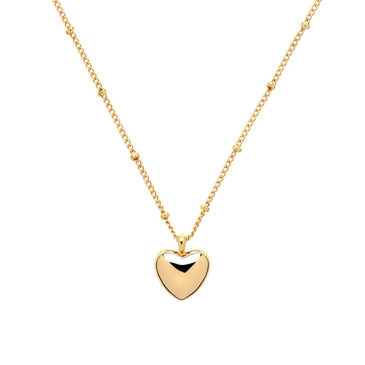 Gold heart-shaped pendant necklace on a white background