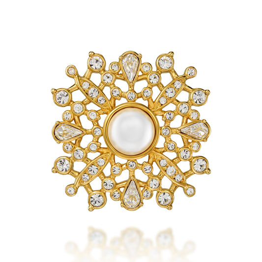 A multi crystal medal style brooch with pearl centre