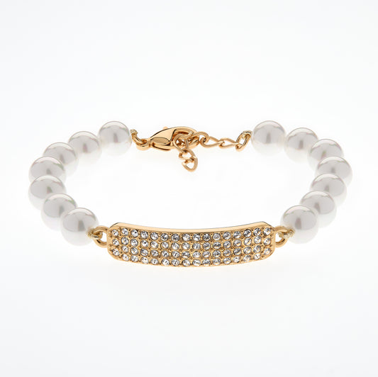 Pearl bracelet with a gold clasp and decorative bar on a white background