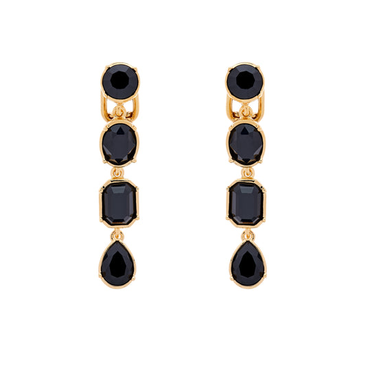 A pair of clip-on earrings featuring multiple cut jet crystals set in gold plating.