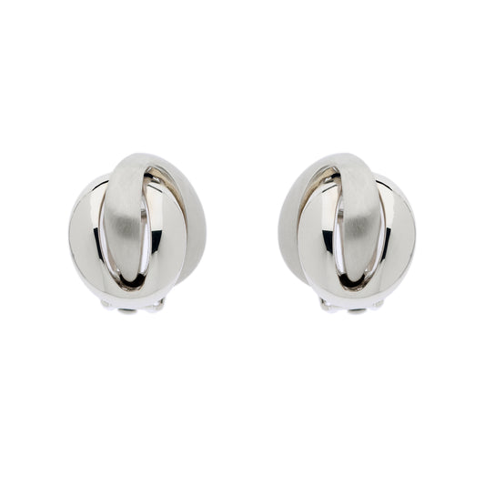 A pair of clip-on earrings with a knot design, featuring polished and satin platinum plating.