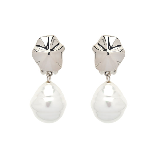 A pair of clip-on earrings featuring a platinum plated shell design with baroque pearls attached at the bottom.