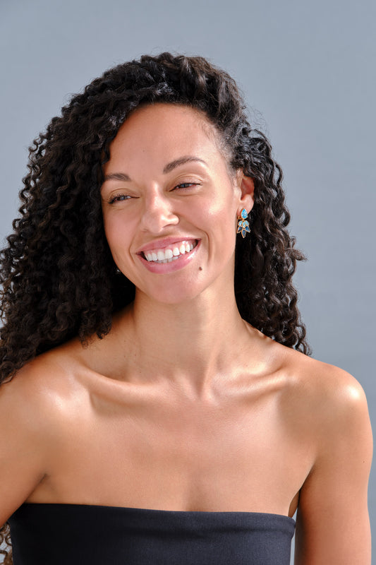 A model wearing Sapphire crystal clip on earrings