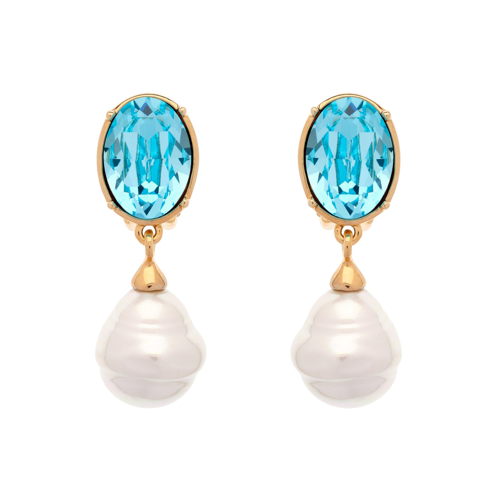 A pair of gold drop earrings featuring oval-cut light blue topaz stones and hanging baroque white pearls, set against a plain white background.