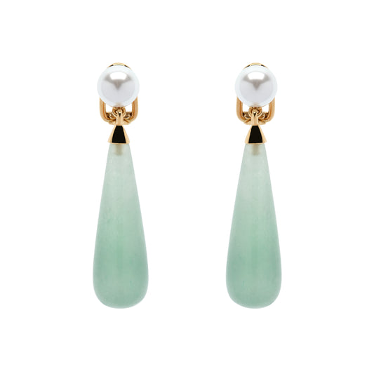 Pair of earrings with white pearls and green teardrop-shaped stones on a white background