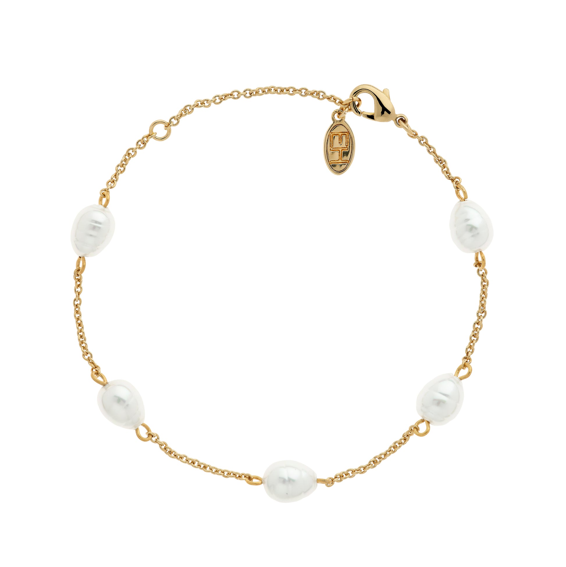 A gold chain bracelet with baroque pearl beads.