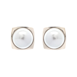 Pair of pearl earrings with gold frames on a white background