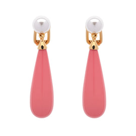 Pair of earrings with pink teardrop-shaped drops and gold accents on a white background