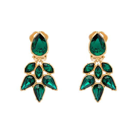 Gold earrings with green gemstones on a white background