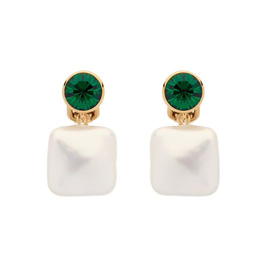 Pair of earrings with green gemstones and white square pendants on a white background