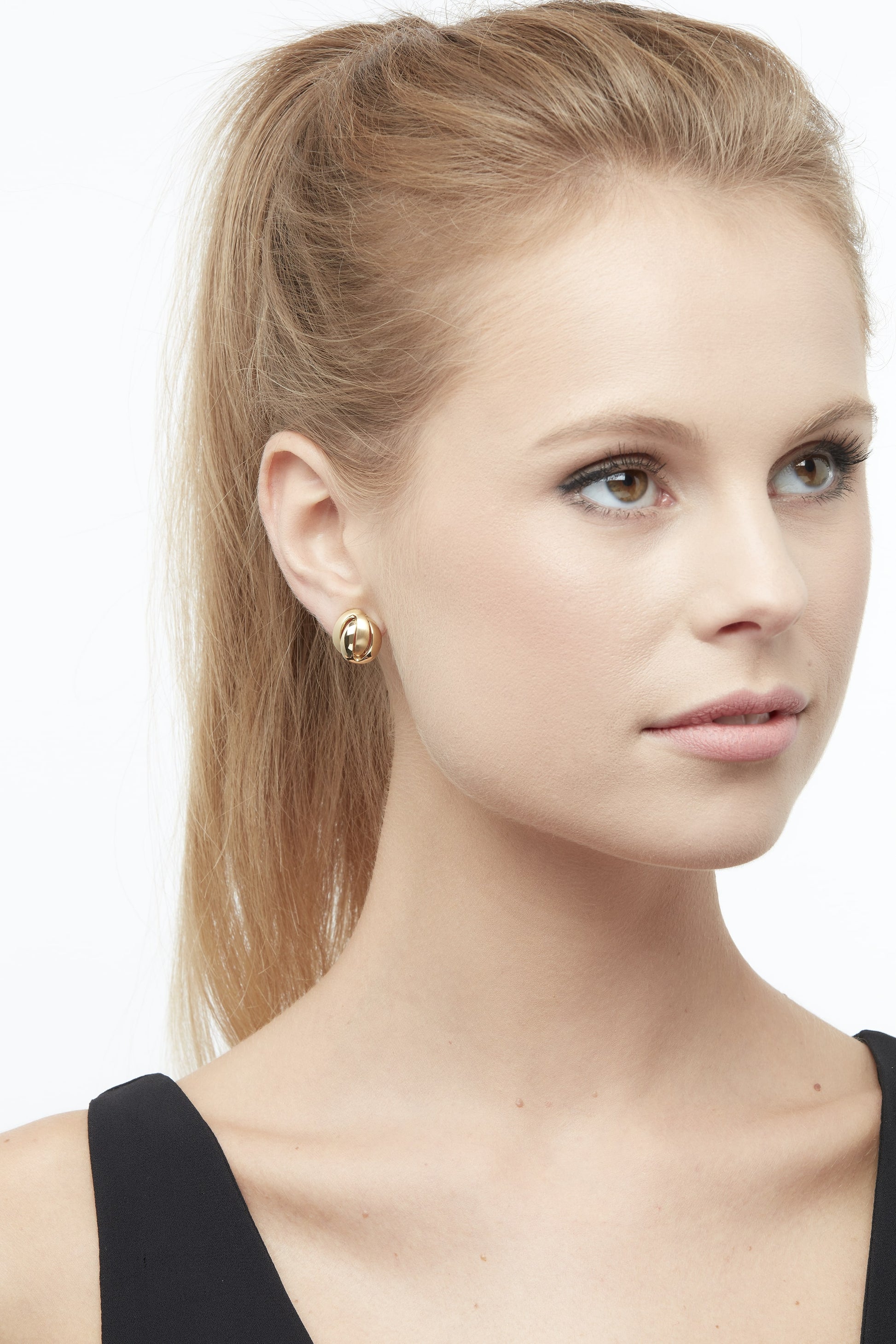 Model in Emma Holland clip on earrings