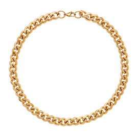A chunky gold chain link necklace laid out on a plain background.