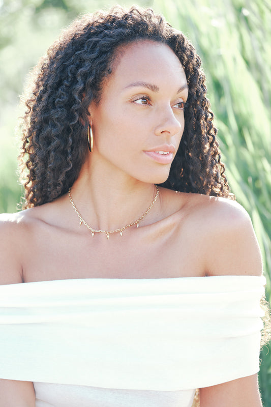 Model and Gold Crystal Droplet Necklace