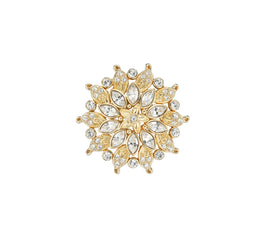 A gold plated crystal studded brooch