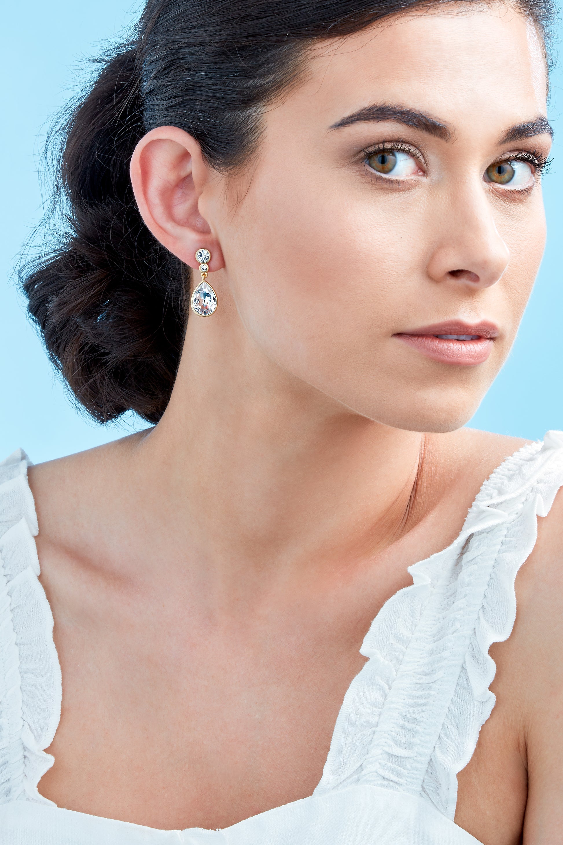 A model showing Emma Holland Gold Teardrop Crystal Earrings