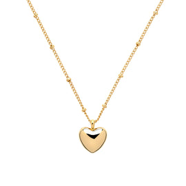 Gold heart-shaped pendant necklace on a white background