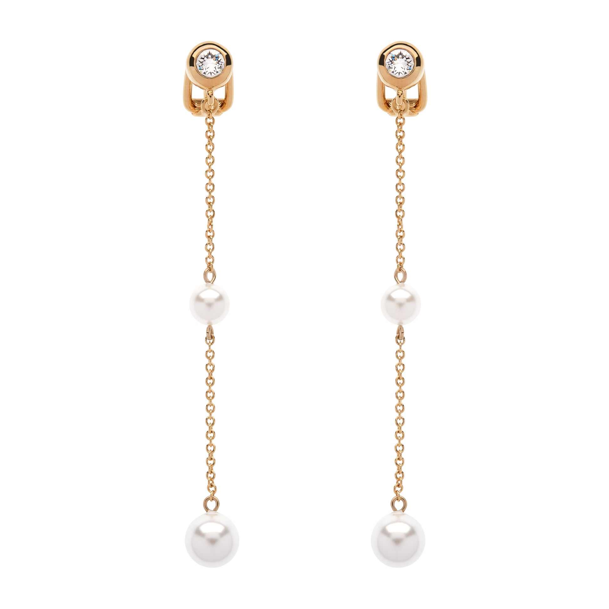 Pair of gold earrings with pearls and gemstones on a white background