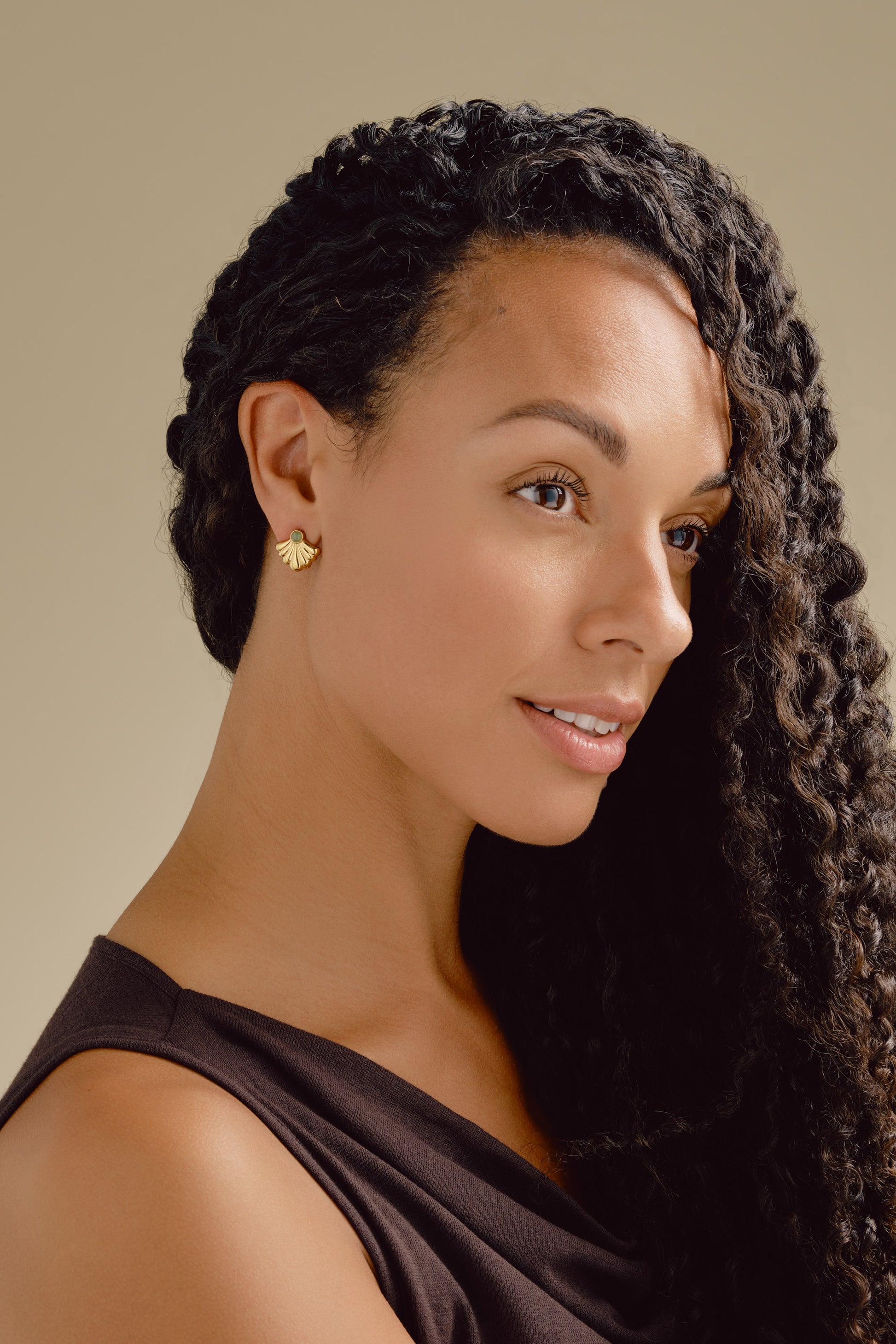 Model shot with aventurine semi precious fan clip on earrings