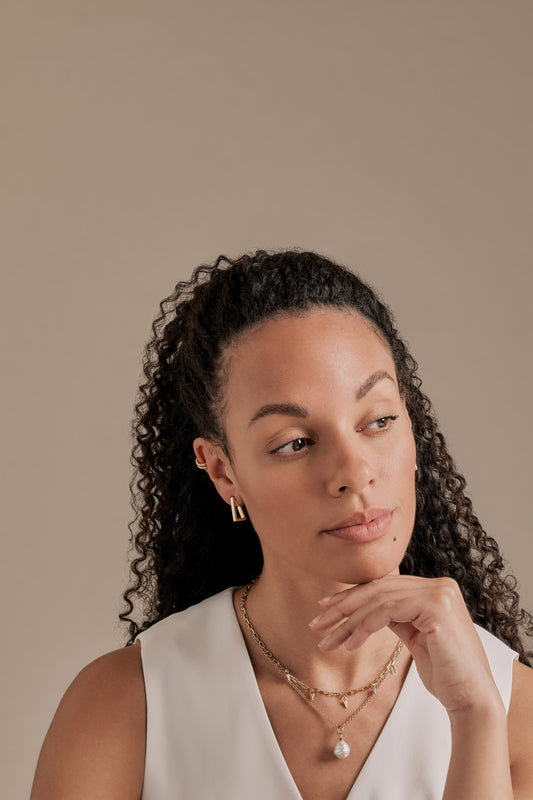 A mix of Gold clip on earrings