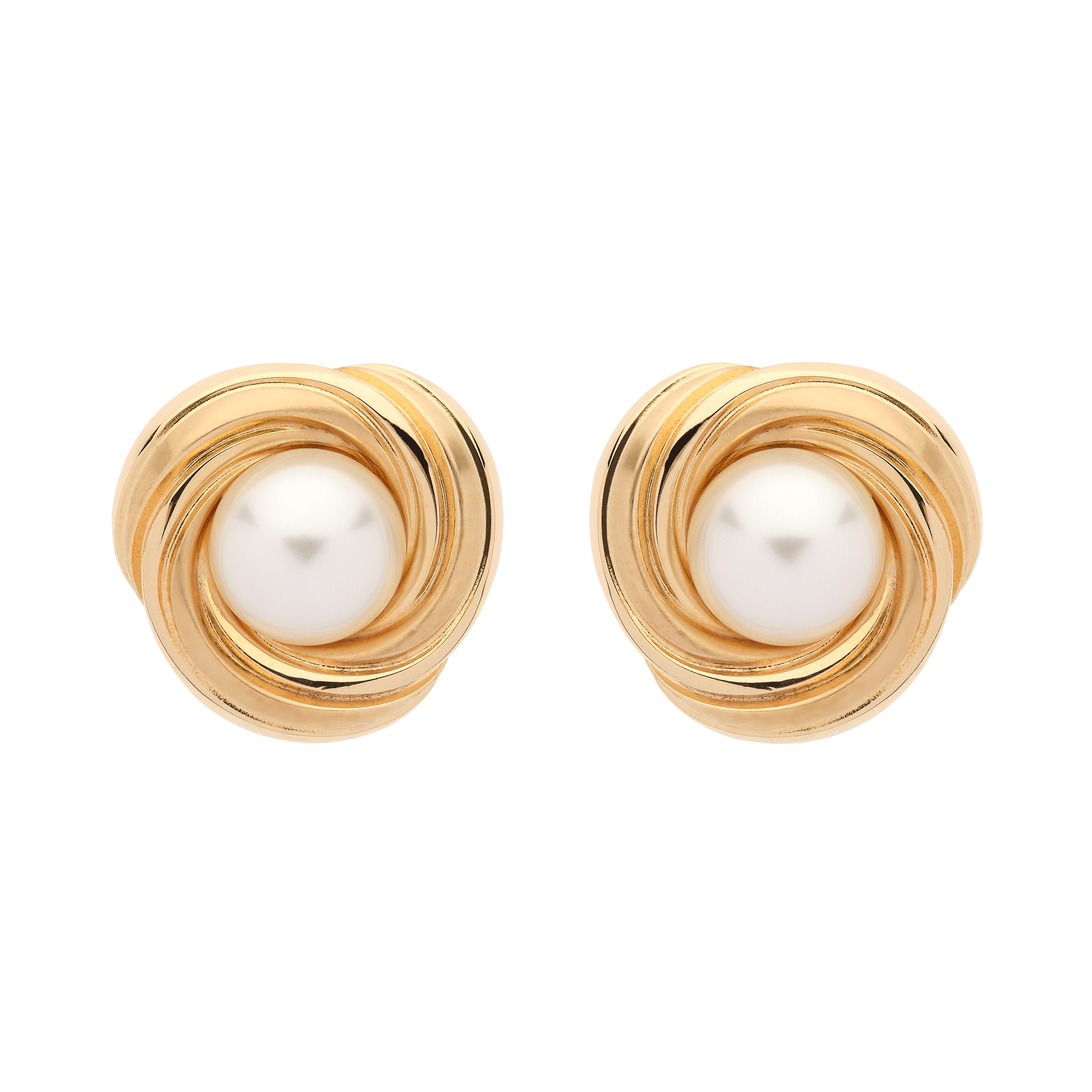 Gold earrings with pearl centers on a white background
