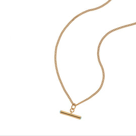 Gold necklace with a bar pendant on a white background