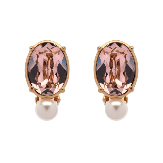 Pair of earrings with pink gemstones and pearl drops on a white background