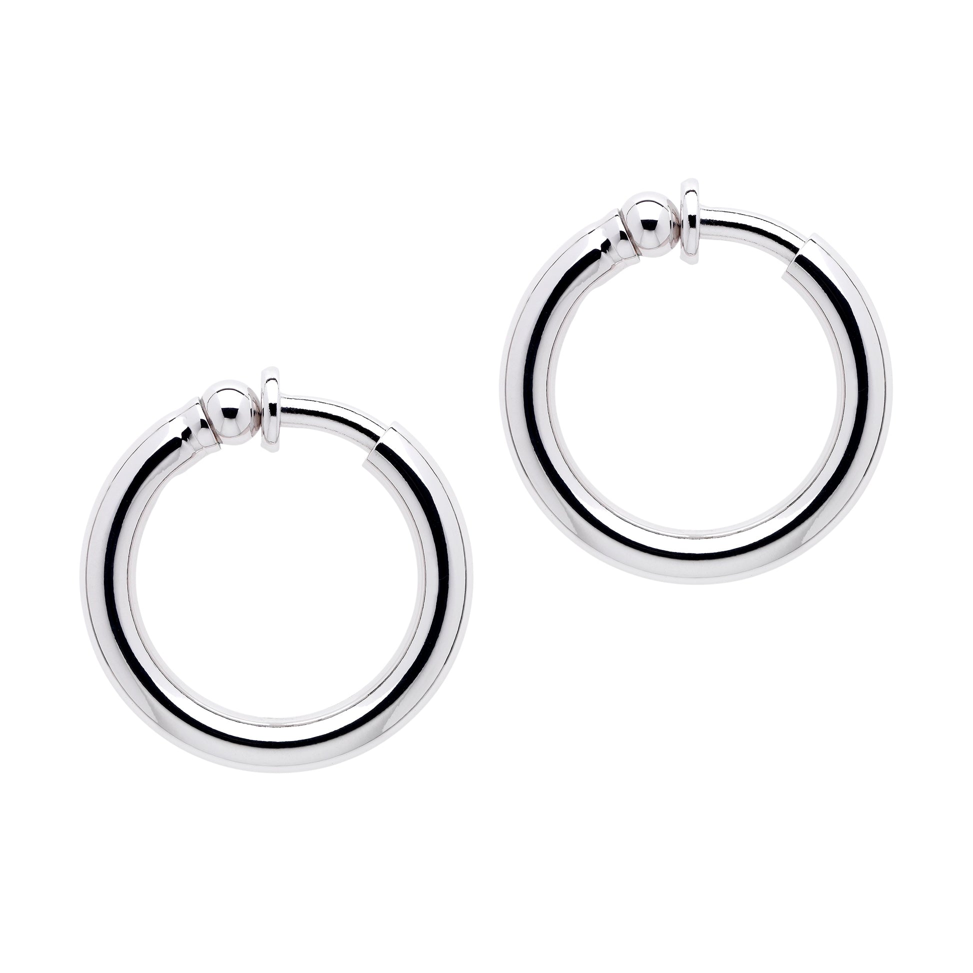 A pair of platinum hoop clip earrings with a polished finish.