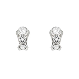 A pair of clip-on earrings featuring a trio of sparkling crystals set in polished platinum plate, with silicone comfort backs.
