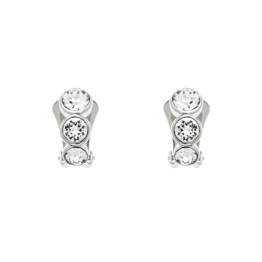 A pair of clip-on earrings featuring a trio of sparkling crystals set in polished platinum plate, with silicone comfort backs.
