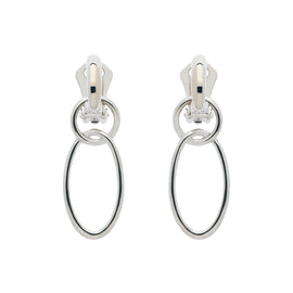 A pair of clip-on earrings featuring two concentric platinum hoops.
