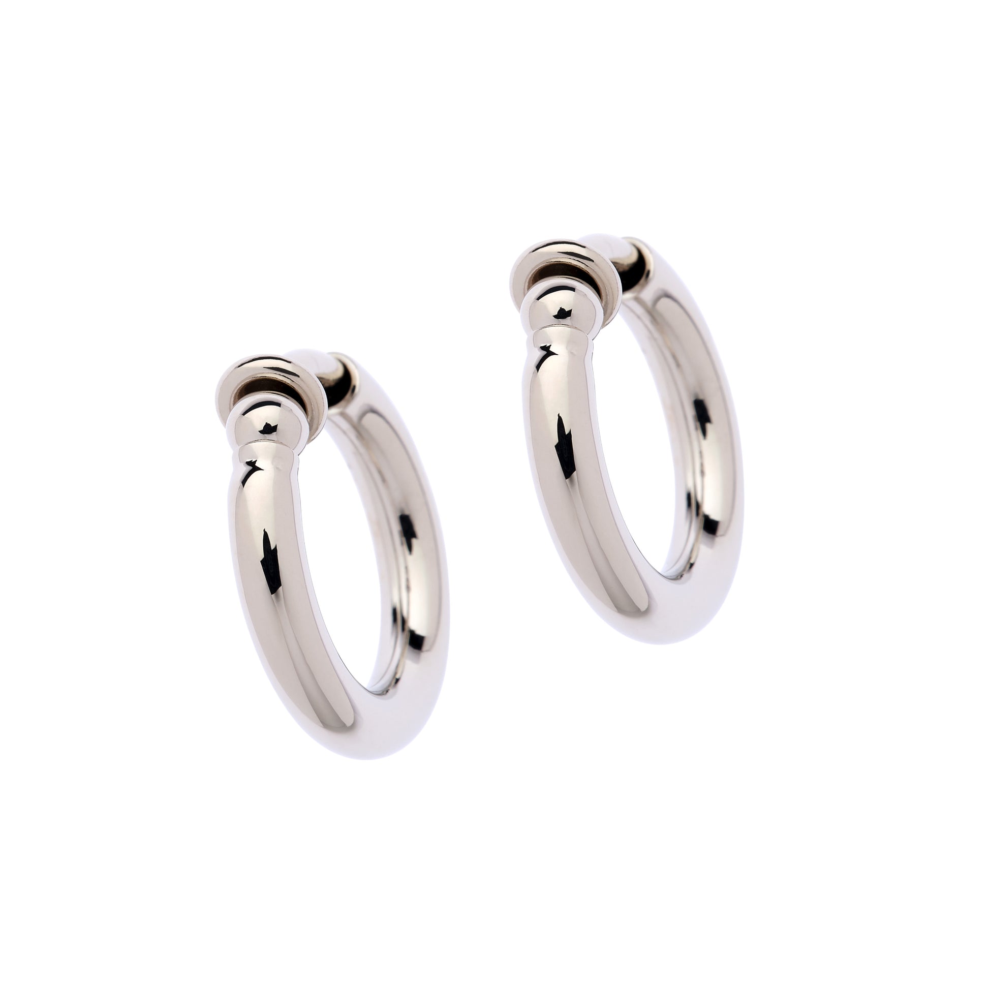 Pair of silver hoop earrings on a white background