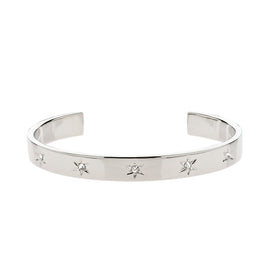A platinum-plated cuff bracelet studded with sparkling crystal stars.