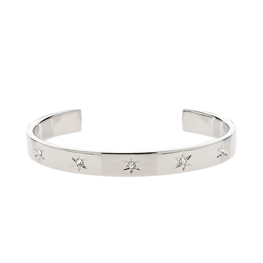 A platinum-plated cuff bracelet studded with sparkling crystal stars.