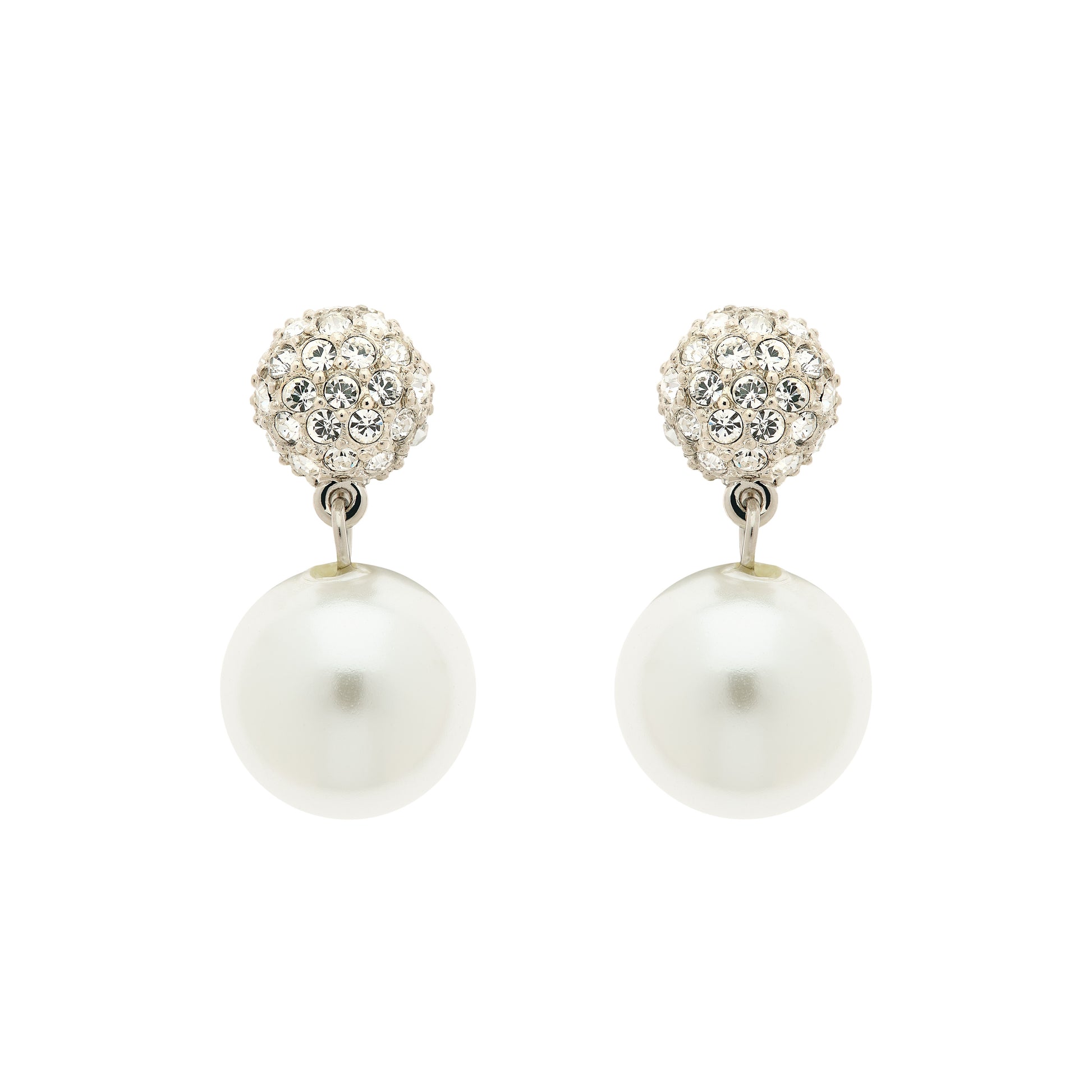 Pair of pearl earrings with crystal tops on a white background