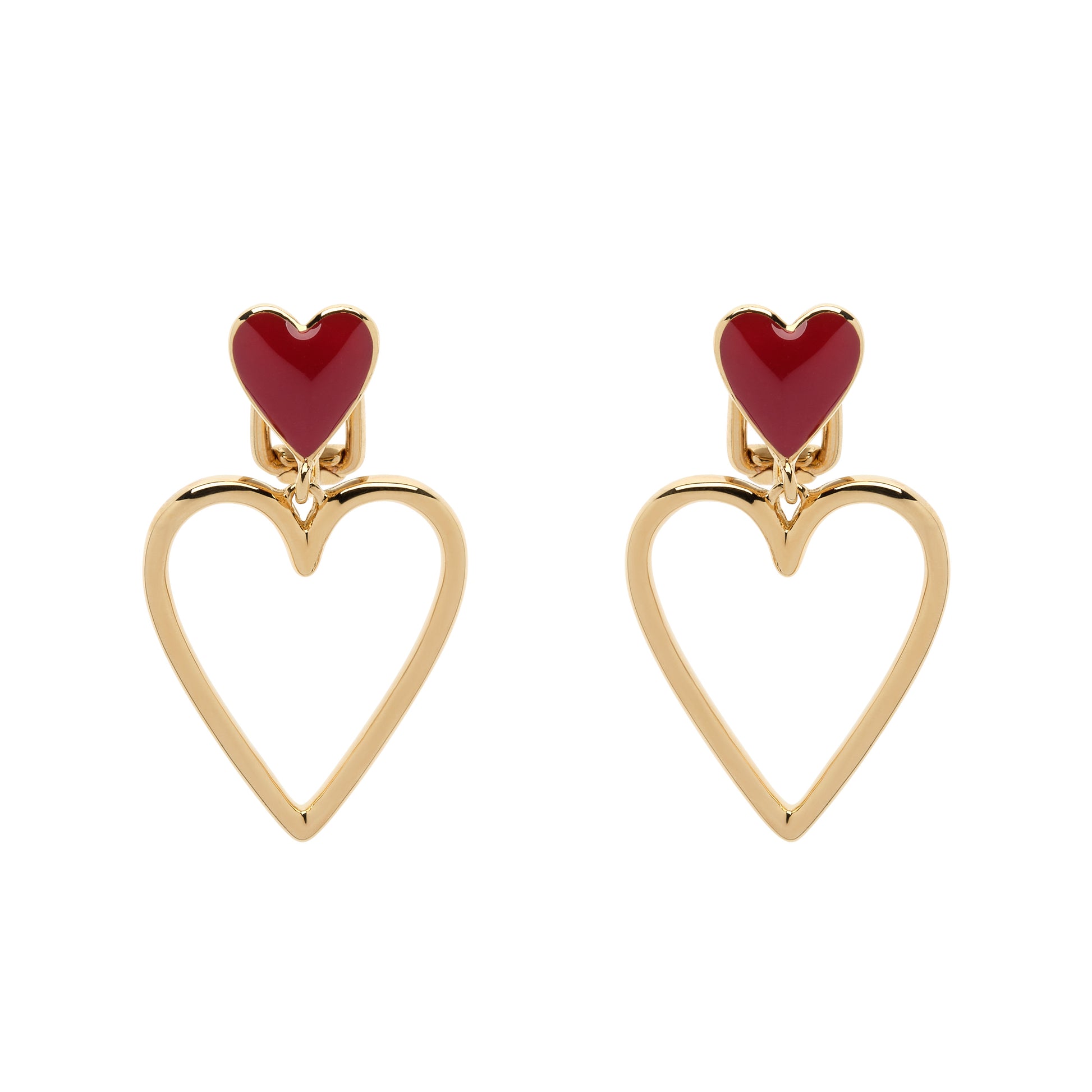 Heart-shaped earrings with red centers and gold frames on a white background