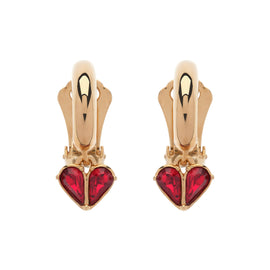 Gold heart-shaped earrings with red gemstones on a white background