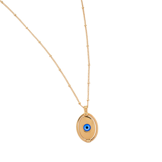 Gold necklace with an oval pendant featuring a blue eye design on a white background