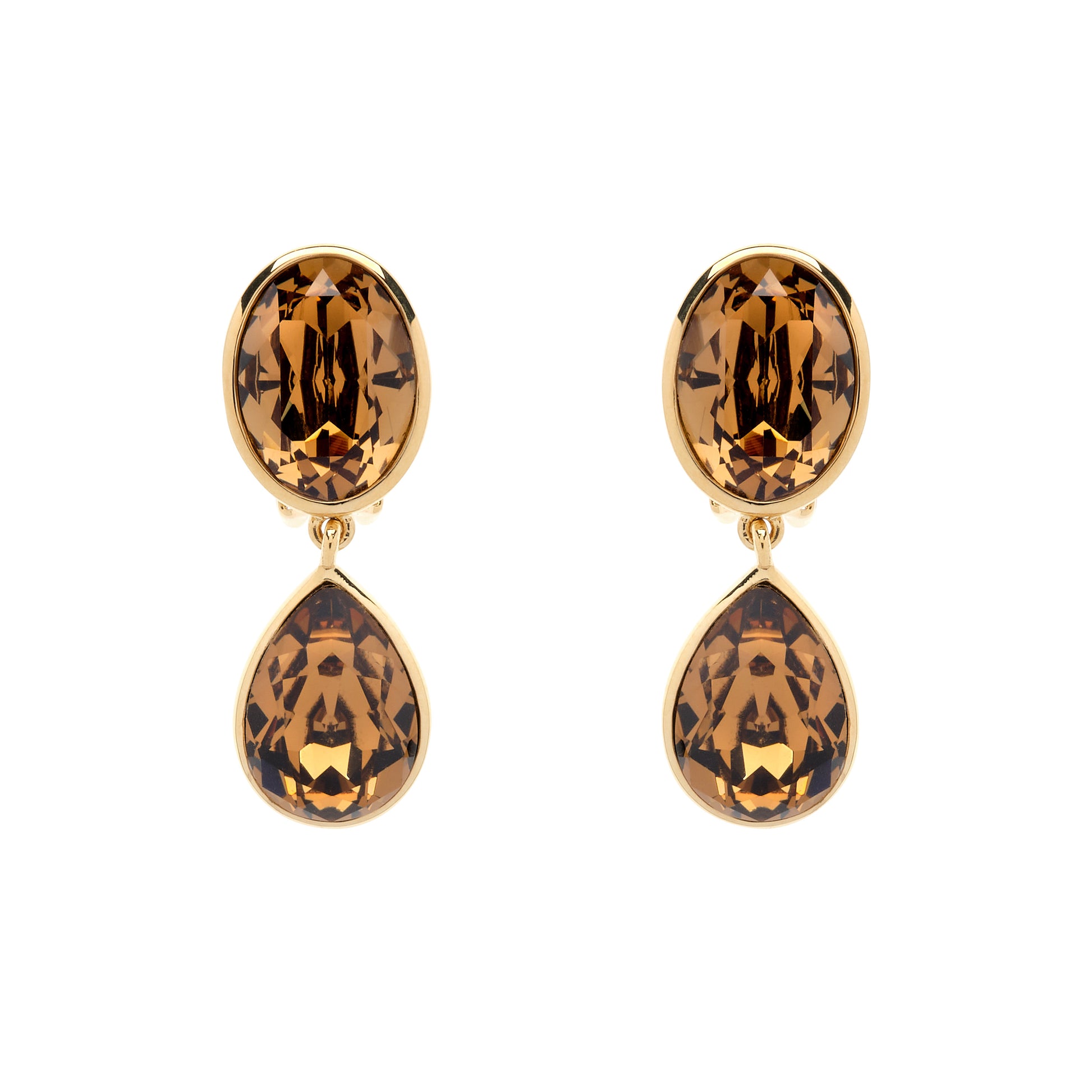 Pair of gold earrings with tortoiseshell pattern on a white background