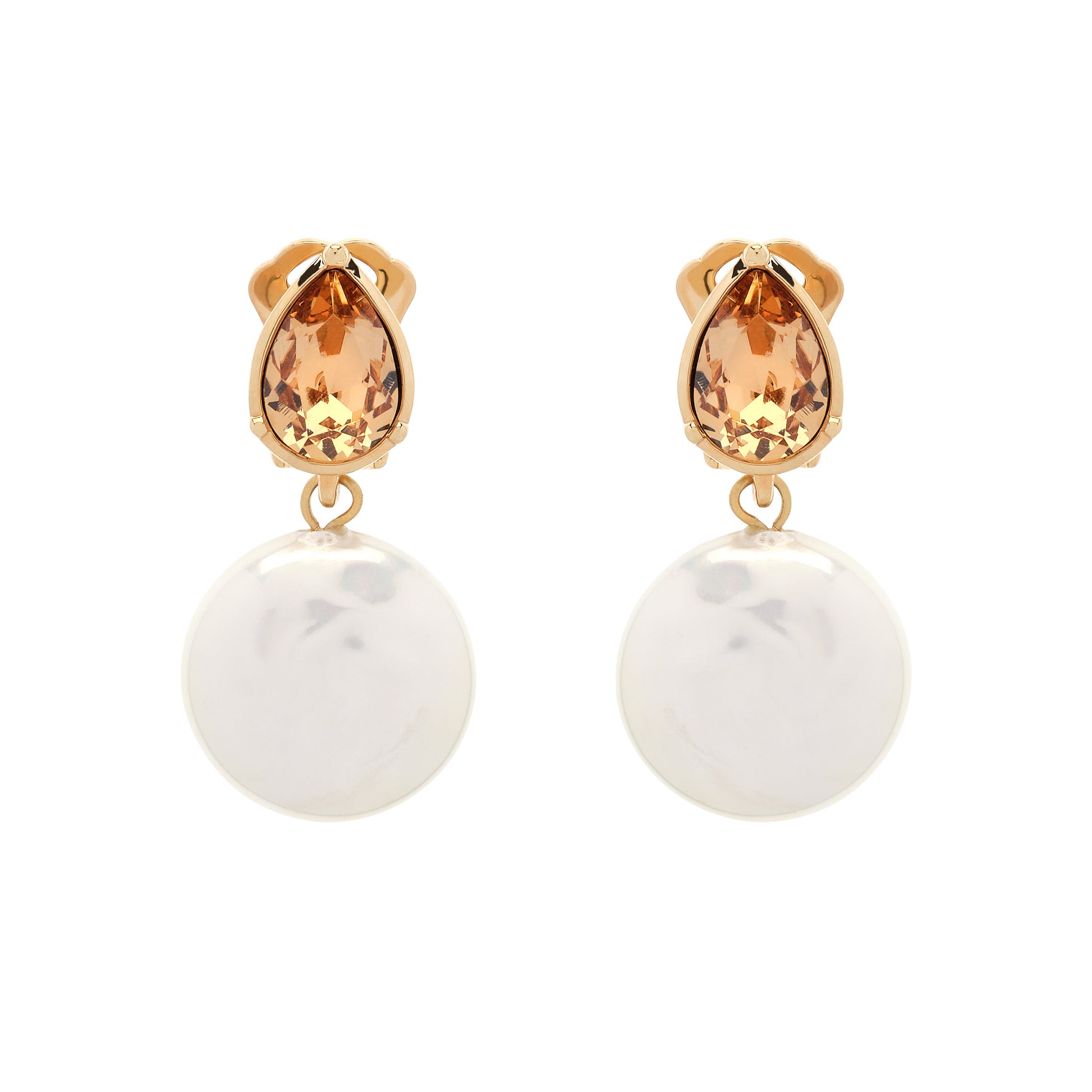 Pair of earrings with teardrop-shaped orange gemstones and round white stones on a white background