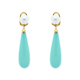 A pair of gold-plated clip-on earrings featuring a pearl at the top with a turquoise teardrop resin drop, against a white background.