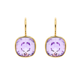 Gold earrings with purple gemstones on a white background