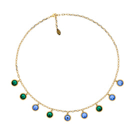 A gold-colored necklace with emerald and violet crystal pendants